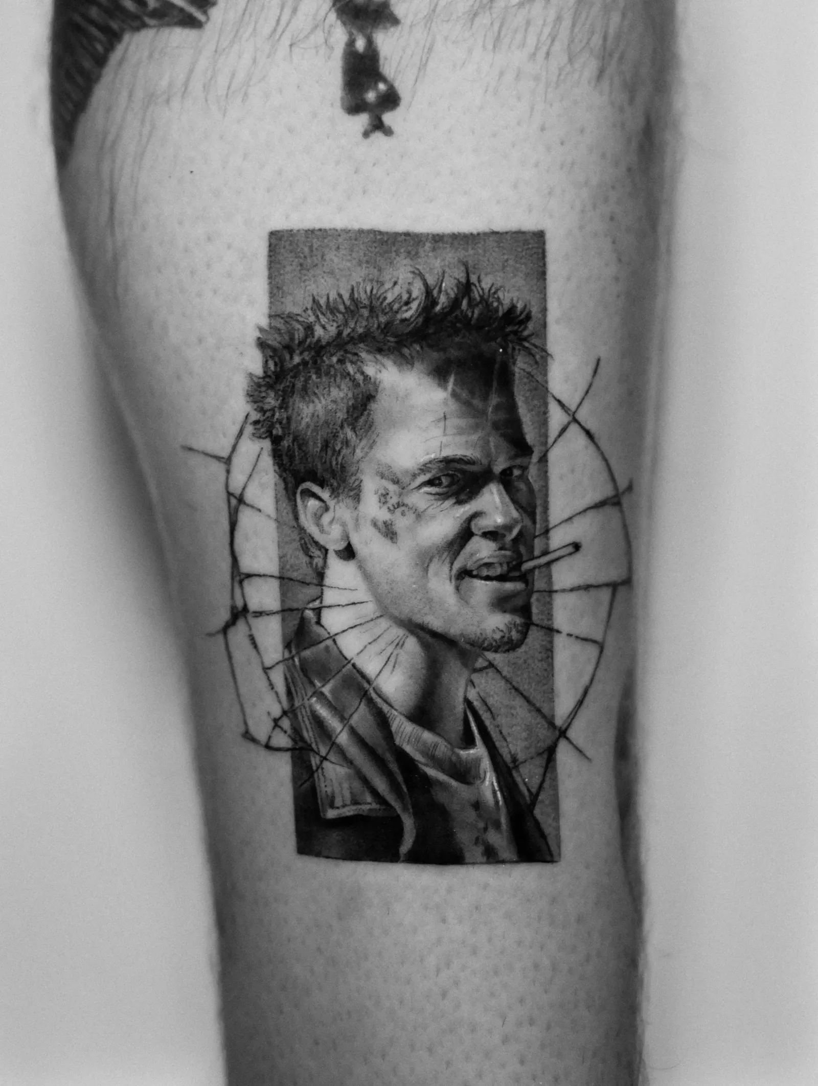 Tattoo 12: portrait on the upper arm